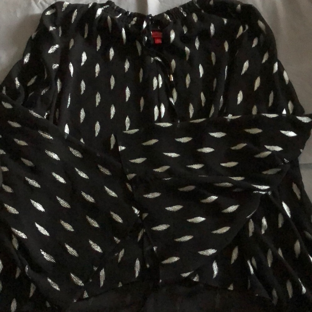 Jennifer Lopez peasant dressy top, sweet flared sleeves, high-low.